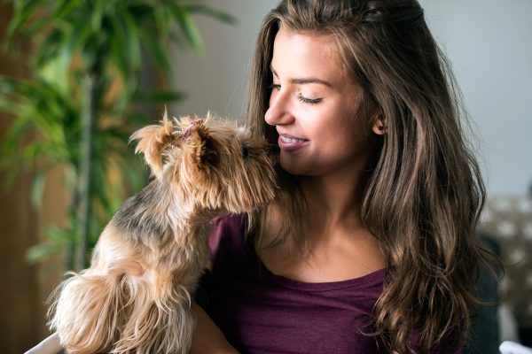 strong-bond-between-a-woman-and-her-cute-dog-XBHUGZH
